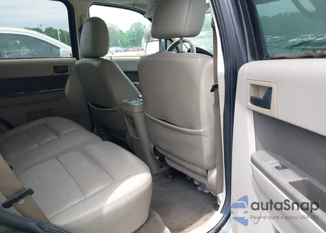 2009 Ford Escape Xlt z USA, uszkodzony, nr VIN 1FMCU03G99KA16639